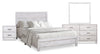 Ensemble de chambre à coucher Arbor 6 pièces bois de grève blanc avec lit à panneaux, commode, miroir et table de nuit - format lit double